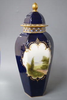 A Royal Worcester landscape painted hexagonal vase and cover signed ‘R.Rushlow’? 24cm